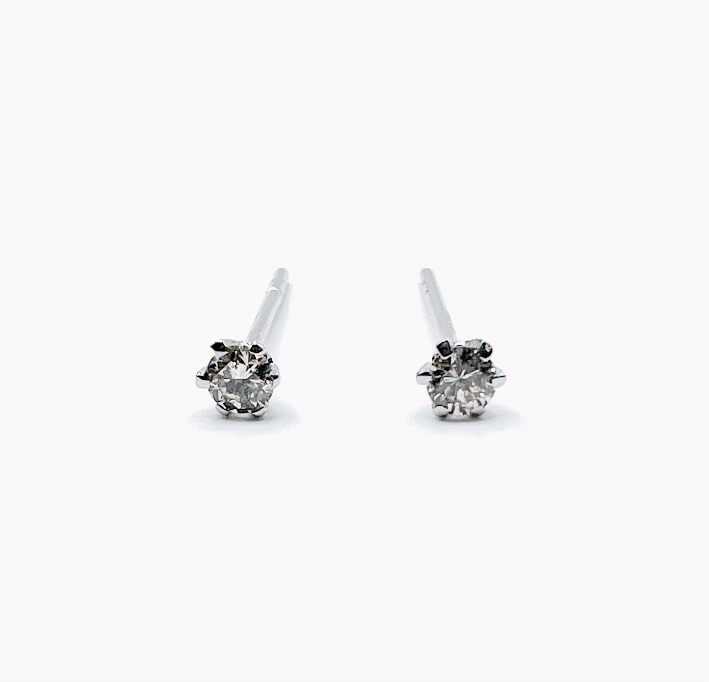 PLATINUM PT900 0.05ct 6 CLAW ROUND DIAMOND STUD EARRINGS