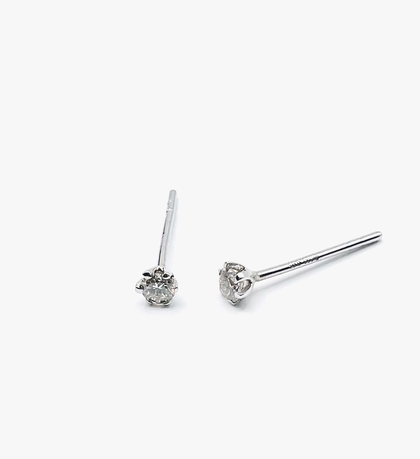 PLATINUM PT900 0.05ct 6 CLAW ROUND DIAMOND STUD EARRINGS